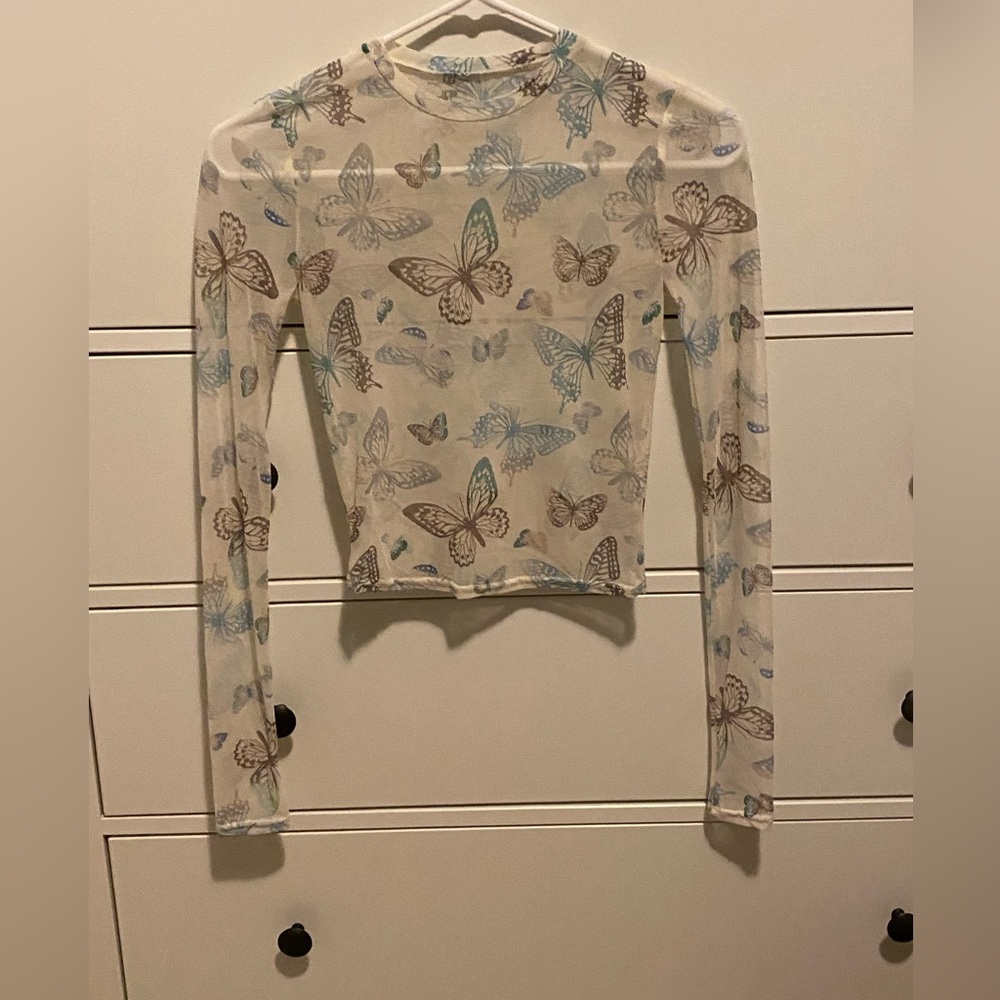 Mesh butterfly top, fits like an XS